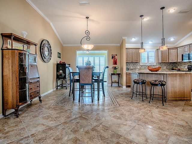 1206 Thompson Ave, The Villages, FL 32162 - dining room with crown molding and baseboards