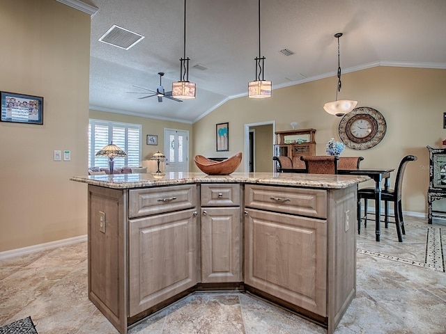 1206 Thompson Ave, The Villages, FL 32162 - kitchen with vaulted ceiling, baseboards, crown molding, a ceiling fan, and light stone countertops