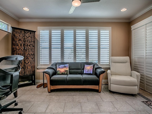 1206 Thompson Ave, The Villages, FL 32162 - living room featuring baseboards, crown molding, a ceiling fan, light stone finish floors, and recessed lighting