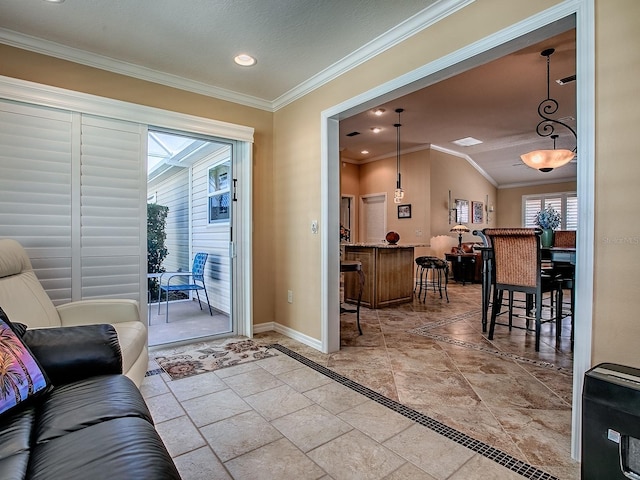 1206 Thompson Ave, The Villages, FL 32162 - living area with baseboards, crown molding, stone tile floors, and recessed lighting
