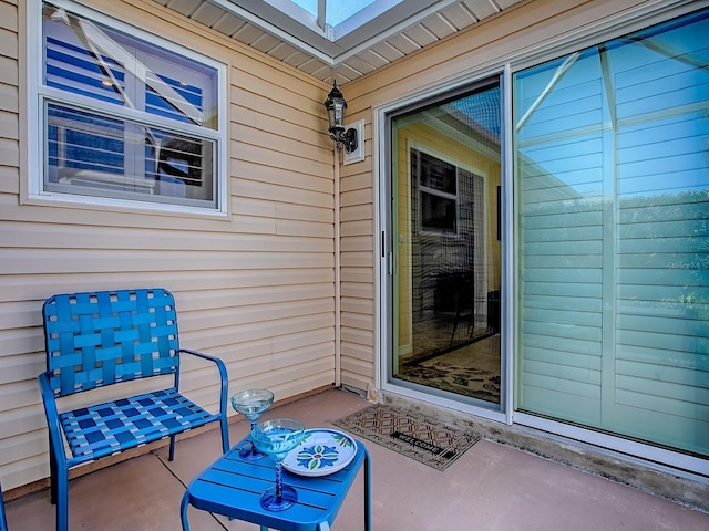 1206 Thompson Ave, The Villages, FL 32162 - view of exterior entry featuring a patio area