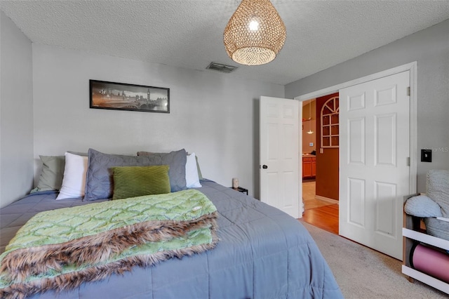 1311 Rain Forest Ln, Minneola, FL 34715 - bedroom featuring carpet flooring and a textured ceiling