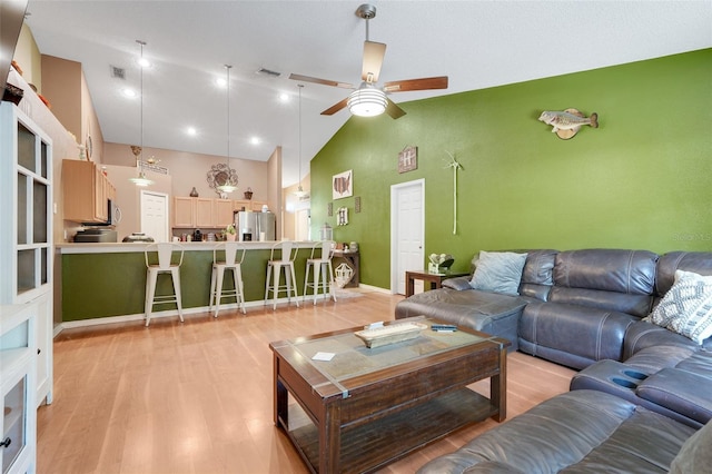 1311 Rain Forest Ln, Minneola, FL 34715 - living area featuring ceiling fan, light wood-style flooring, and high vaulted ceiling