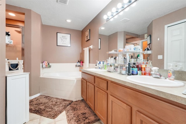 1311 Rain Forest Ln, Minneola, FL 34715 - full bath with double vanity, a garden tub, a stall shower, tile patterned flooring, and recessed lighting