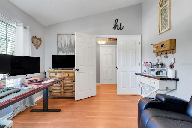 1311 Rain Forest Ln, Minneola, FL 34715 - office area with vaulted ceiling and light wood-style floors