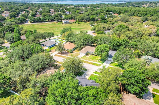 1311 Rain Forest Ln, Minneola, FL 34715 - aerial perspective of suburban area with a large body of water