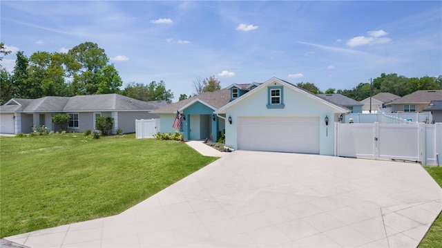 view of front facade with stucco siding, a gate, an attached garage, and driveway