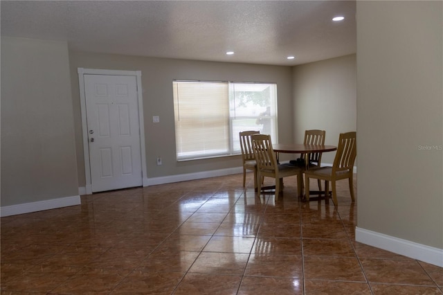 2701 S Dellwood Dr, Eustis, FL 32726 - dining space featuring recessed lighting, baseboards, and a textured ceiling
