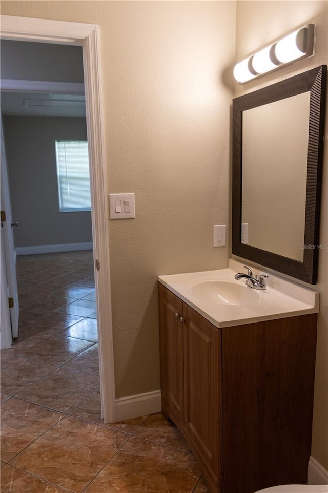 2701 S Dellwood Dr, Eustis, FL 32726 - bathroom with baseboards and vanity