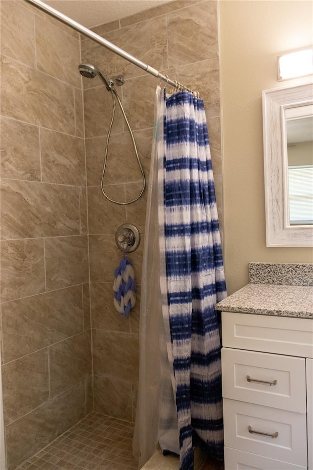 2701 S Dellwood Dr, Eustis, FL 32726 - bathroom with a tile shower and vanity