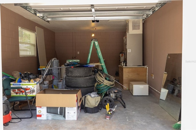 2701 S Dellwood Dr, Eustis, FL 32726 - garage with concrete block wall and a garage door opener