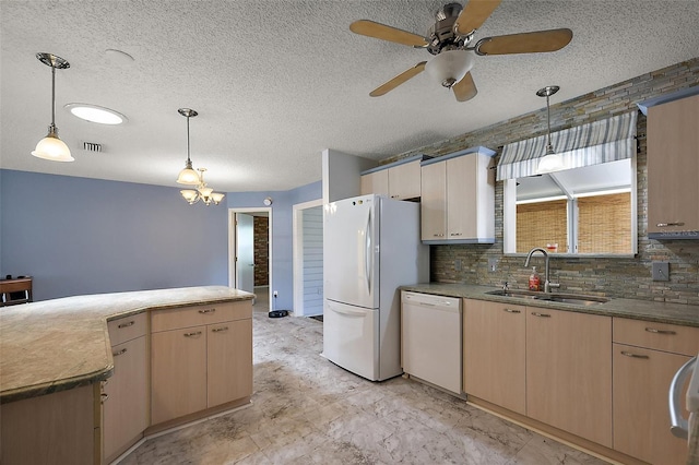 2003 Cordero Ct, The Villages, FL 32159 - kitchen with white appliances, ceiling fan, tasteful backsplash, light brown cabinets, and a textured ceiling