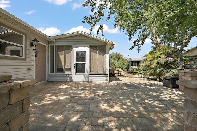 2003 Cordero Ct, The Villages, FL 32159 - view of patio with a sunroom