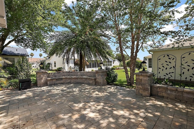 2003 Cordero Ct, The Villages, FL 32159 - gate featuring a patio area