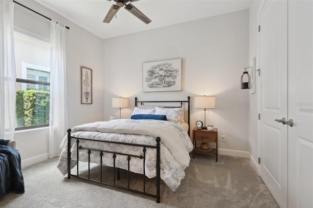 9307 San Jose Blvd, Howey In The Hills, FL 34737 - bedroom with carpet floors, baseboards, and ceiling fan