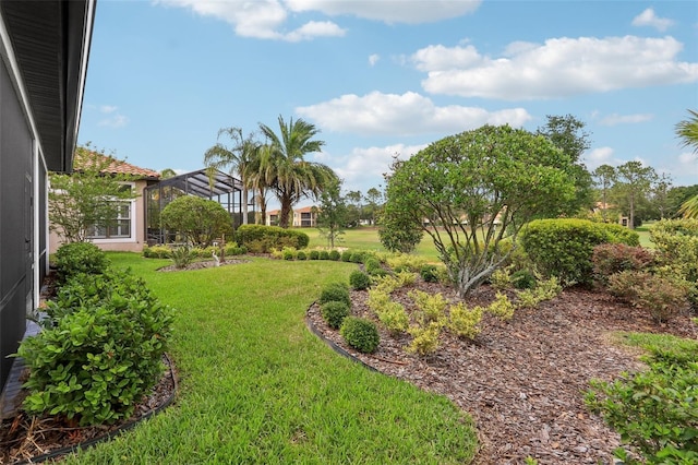 9307 San Jose Blvd, Howey In The Hills, FL 34737 - view of green lawn featuring glass enclosure