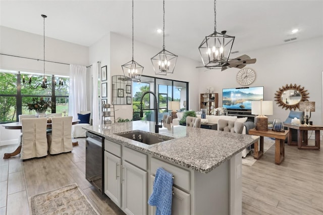 9307 San Jose Blvd, Howey In The Hills, FL 34737 - kitchen with a chandelier, a sink, dishwasher, open floor plan, and recessed lighting