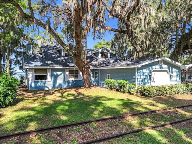 1107 Northshore Dr, Eustis, FL 32726 - view of front of property with a front yard