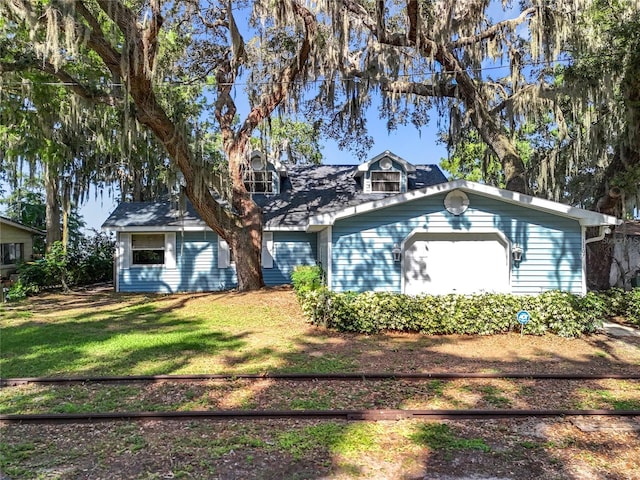 1107 Northshore Dr, Eustis, FL 32726 - view of front of house featuring a front yard