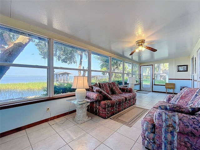 1107 Northshore Dr, Eustis, FL 32726 - sunroom with tile patterned flooring and baseboards