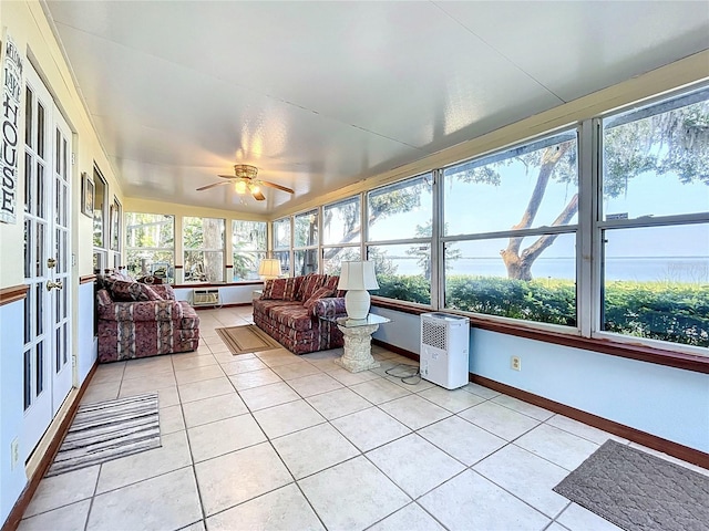 1107 Northshore Dr, Eustis, FL 32726 - sunroom / solarium featuring tile patterned flooring, healthy amount of natural light, and baseboards