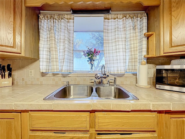 1107 Northshore Dr, Eustis, FL 32726 - kitchen featuring a sink, plenty of natural light, and tile countertops