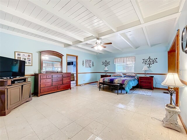 1107 Northshore Dr, Eustis, FL 32726 - bedroom featuring multiple windows, baseboards, ceiling fan, and beam ceiling