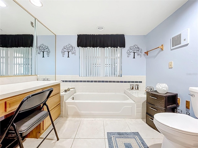 1107 Northshore Dr, Eustis, FL 32726 - bathroom featuring a garden tub, toilet, tile patterned floors, and recessed lighting