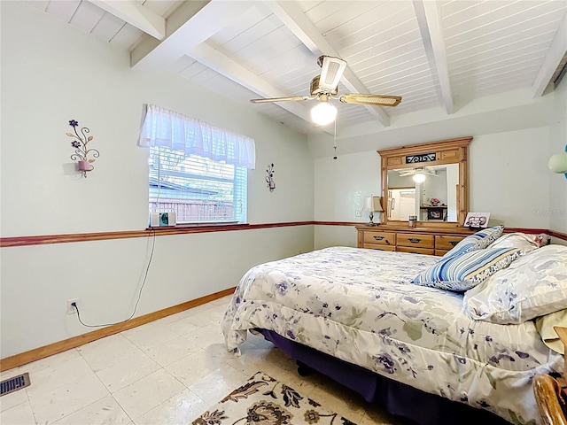 1107 Northshore Dr, Eustis, FL 32726 - bedroom featuring baseboards, beam ceiling, and ceiling fan