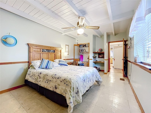 1107 Northshore Dr, Eustis, FL 32726 - bedroom featuring beam ceiling, baseboards, and a ceiling fan
