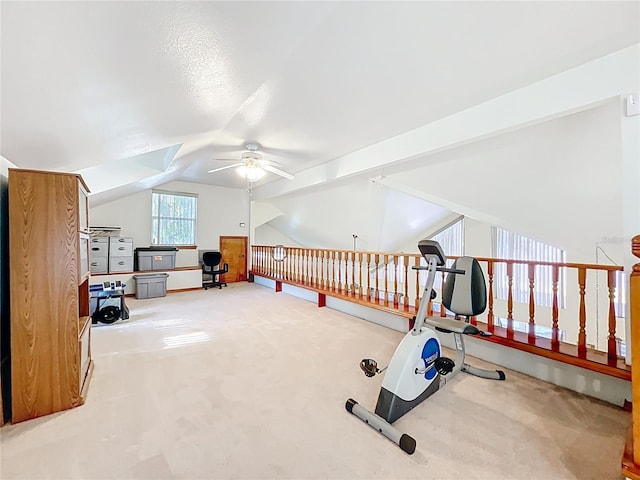 1107 Northshore Dr, Eustis, FL 32726 - exercise room featuring ceiling fan, carpet flooring, and vaulted ceiling