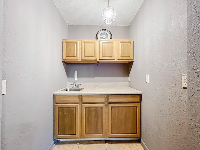 1107 Northshore Dr, Eustis, FL 32726 - bar with a sink, light tile patterned floors, a textured ceiling, baseboards, and hanging light fixtures