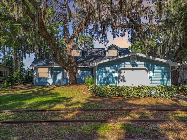 1107 Northshore Dr, Eustis, FL 32726 - view of front facade with a front yard