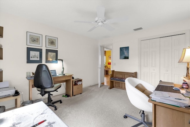 office with carpet and ceiling fan