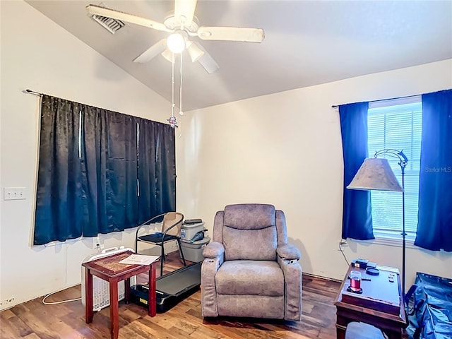 6710 Winkles St, Coleman, FL 33521 - sitting room with wood finished floors, ceiling fan, and lofted ceiling