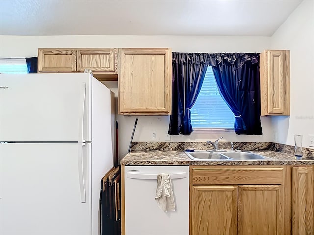 6710 Winkles St, Coleman, FL 33521 - kitchen with white appliances, light brown cabinets, a sink, and dark countertops