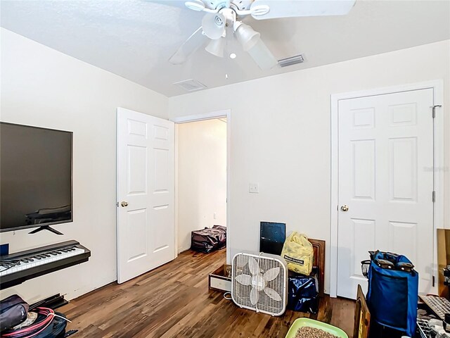 6710 Winkles St, Coleman, FL 33521 - misc room featuring wood finished floors and ceiling fan