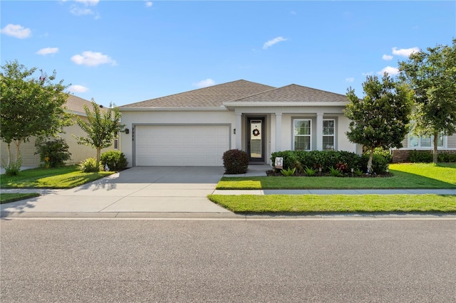 2928 Marlberry Ln, Clermont, FL 34714 - single story home featuring an attached garage, stucco siding, a front lawn, and concrete driveway