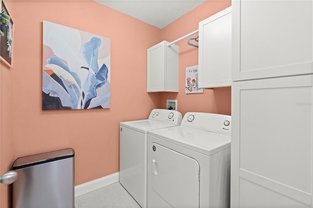 2928 Marlberry Ln, Clermont, FL 34714 - laundry area featuring cabinet space, washer and dryer, and baseboards