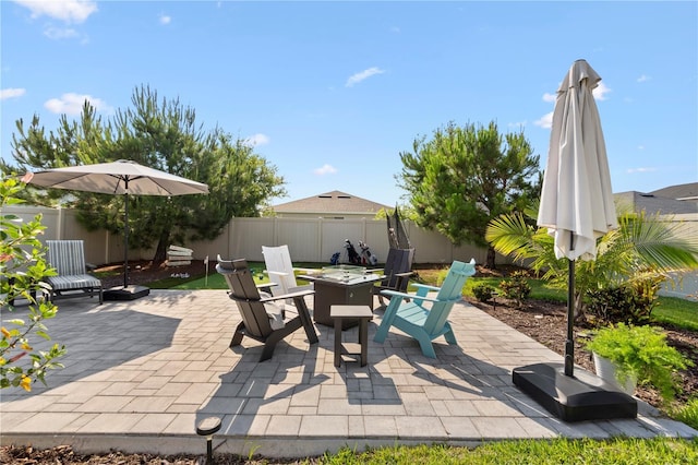 2928 Marlberry Ln, Clermont, FL 34714 - fenced backyard with a fire pit and a patio area