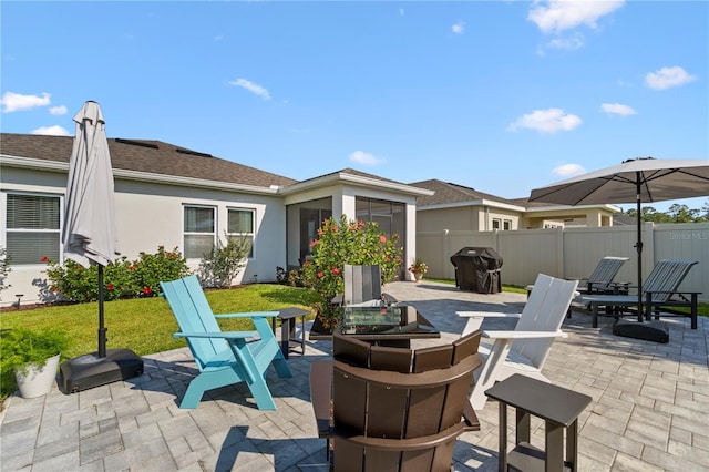 2928 Marlberry Ln, Clermont, FL 34714 - view of patio with area for grilling and an outdoor fire pit