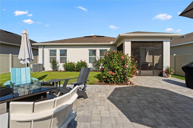 2928 Marlberry Ln, Clermont, FL 34714 - view of patio featuring a sunroom and central AC