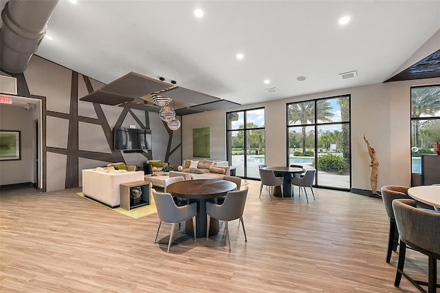 2928 Marlberry Ln, Clermont, FL 34714 - dining space with light wood-style floors, recessed lighting, and baseboards