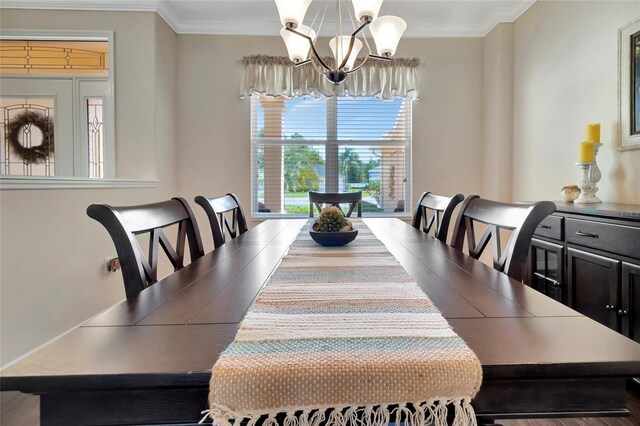 4716 Heritage Trl, Leesburg, FL 34748 - dining space featuring a chandelier and ornamental molding