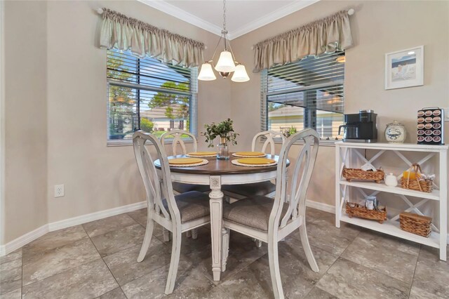 4716 Heritage Trl, Leesburg, FL 34748 - dining space featuring ornamental molding, a chandelier, and baseboards