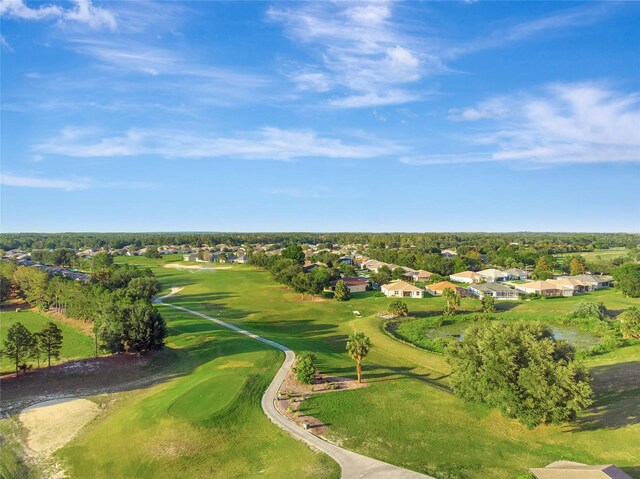 4716 Heritage Trl, Leesburg, FL 34748 - aerial view of property and surrounding area featuring nearby suburban area and a golf course