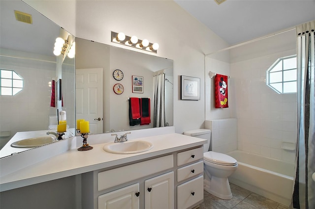25406 Crestwater Dr, Leesburg, FL 34748 - bathroom featuring tile patterned floors, shower / bath combo, toilet, and double vanity