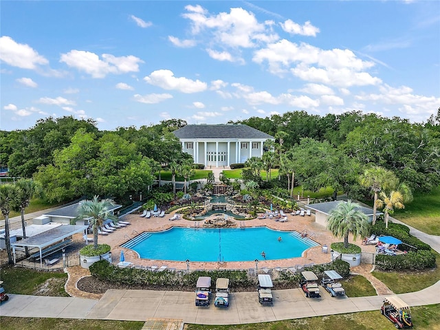 25406 Crestwater Dr, Leesburg, FL 34748 - community pool with a patio