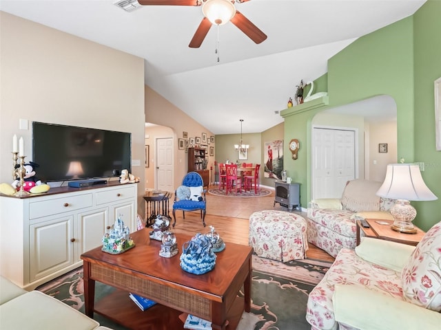 10986 SE 171st Street Rd, Summerfield, FL 34491 - living area with arched walkways, lofted ceiling, ceiling fan, and a chandelier