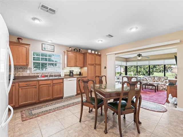 10986 SE 171st Street Rd, Summerfield, FL 34491 - dining space featuring light tile patterned floors, plenty of natural light, and ceiling fan